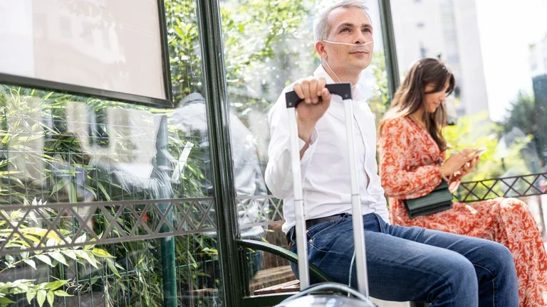 Oxygen therapy in adults - male at the bus station 3