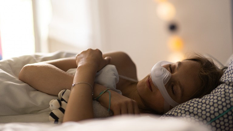 Obstructive sleep apnea in children - patient waking up (girl) 1